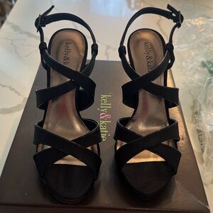 Brand New Never worn in box Kelly & Katie Black Heel. Size 7. Beautiful shoe!